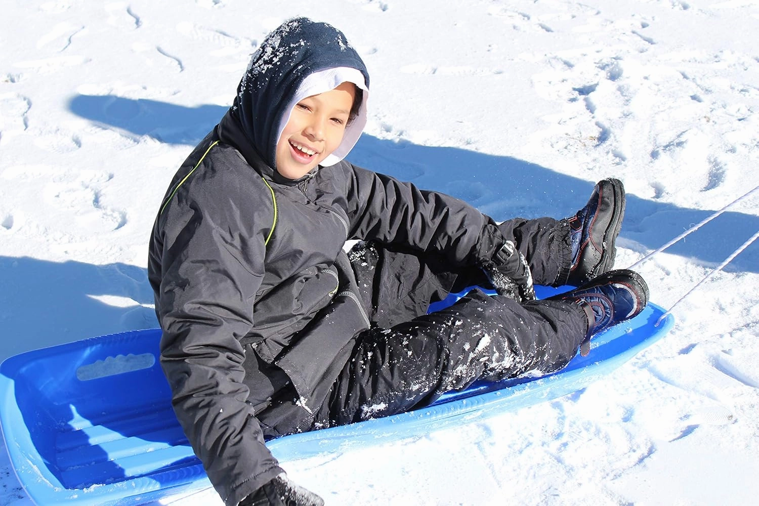 Slippery Racer Downhill Xtreme Flexible Adults and Kids Plastic Toboggan Snow Sled for up to 2 Riders with Pull Rope and Handles.