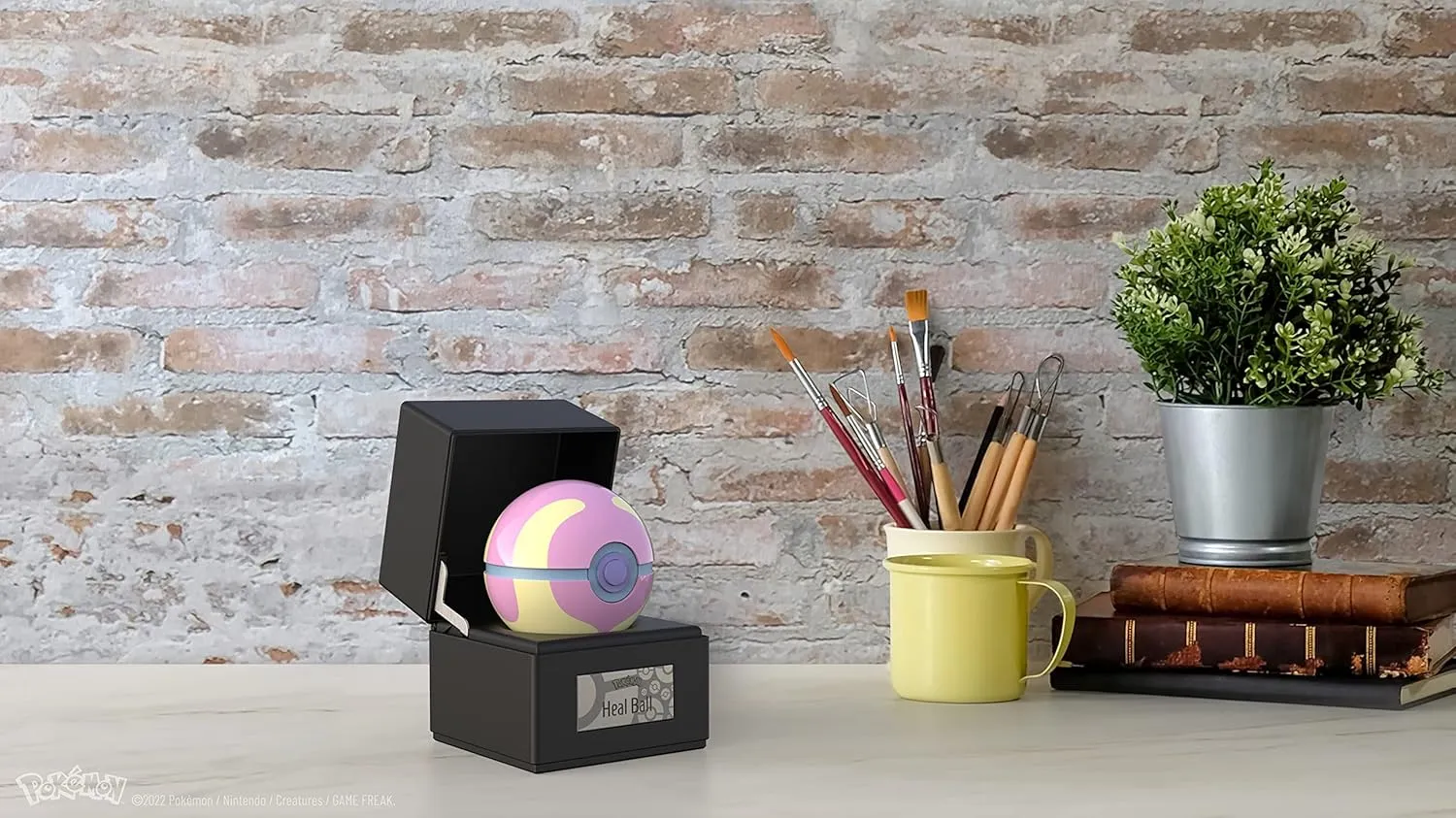The Wand Company Original Poké Ball Authentic Replica - Realistic, Electronic, Die-Cast Poké Ball with Display Case Light Features – Officially Licensed by Pokémon